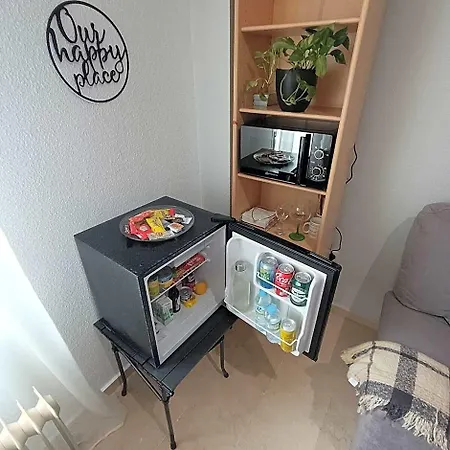 Dormitorio, Sala De Estar Y Bano Privado Отель Бадахос